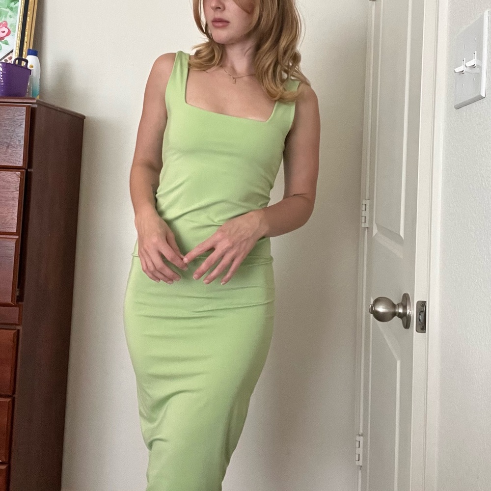 Green midi body con dress